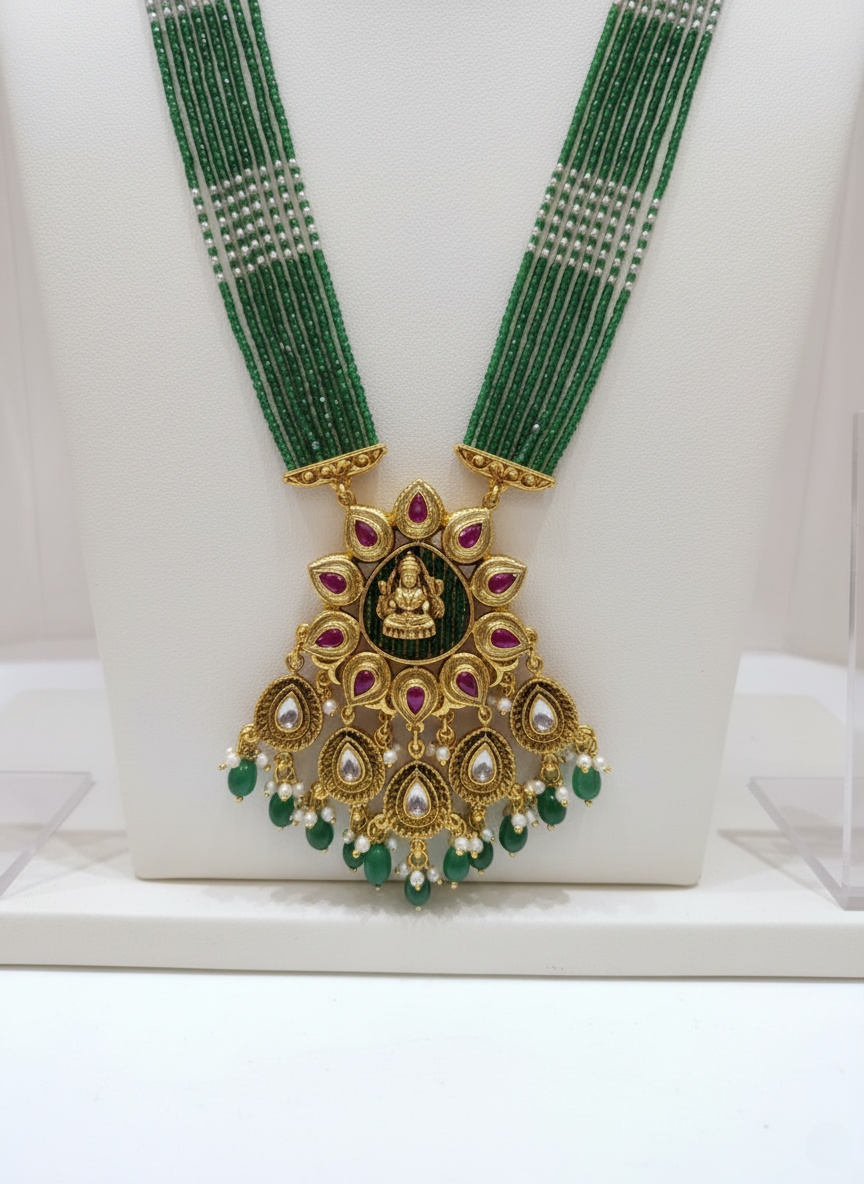 Majestic Gold & Green Kundan Necklace Set with Traditional Motif