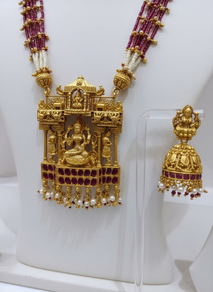 Divine Elegance in Ruby and Pearl