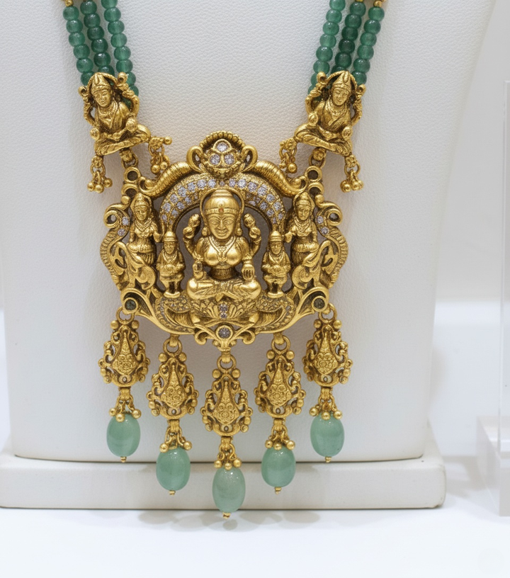 Traditional Temple Jewelry Set with Lakshmi Pendant and Green Beads
