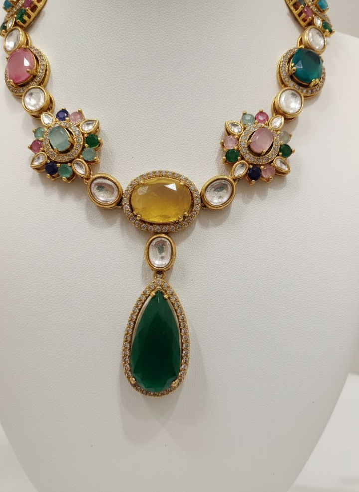 Emerald Green and Multicolor Kundan Necklace Set with Pear Drop Pendant