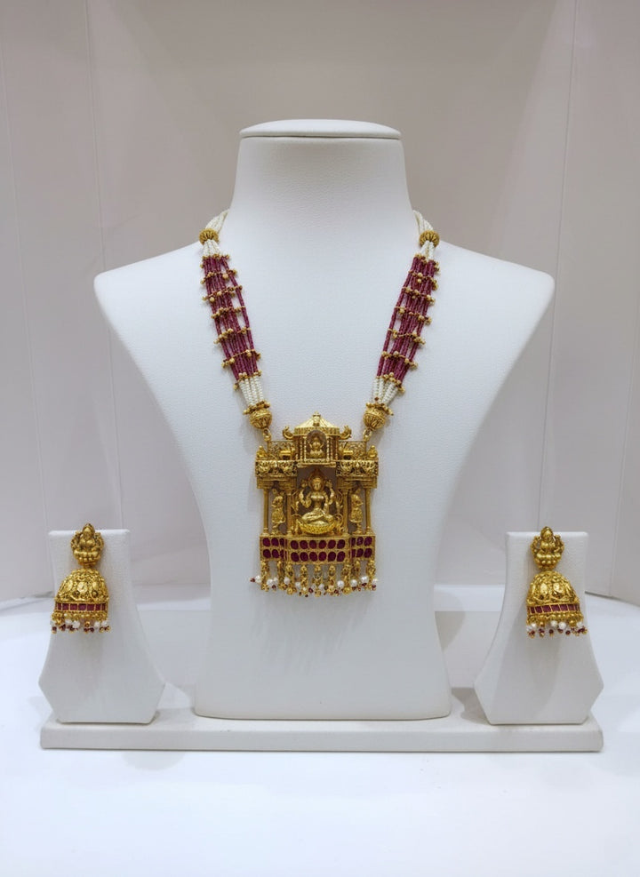 Divine Elegance in Ruby and Pearl