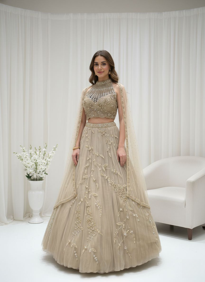 Champagne Gold Embroidered Net Lehenga Set with Cape Dupatta