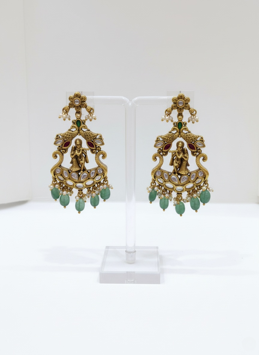 Antique Gold Necklace Set with Radha-Krishna Motif and Emerald Drops