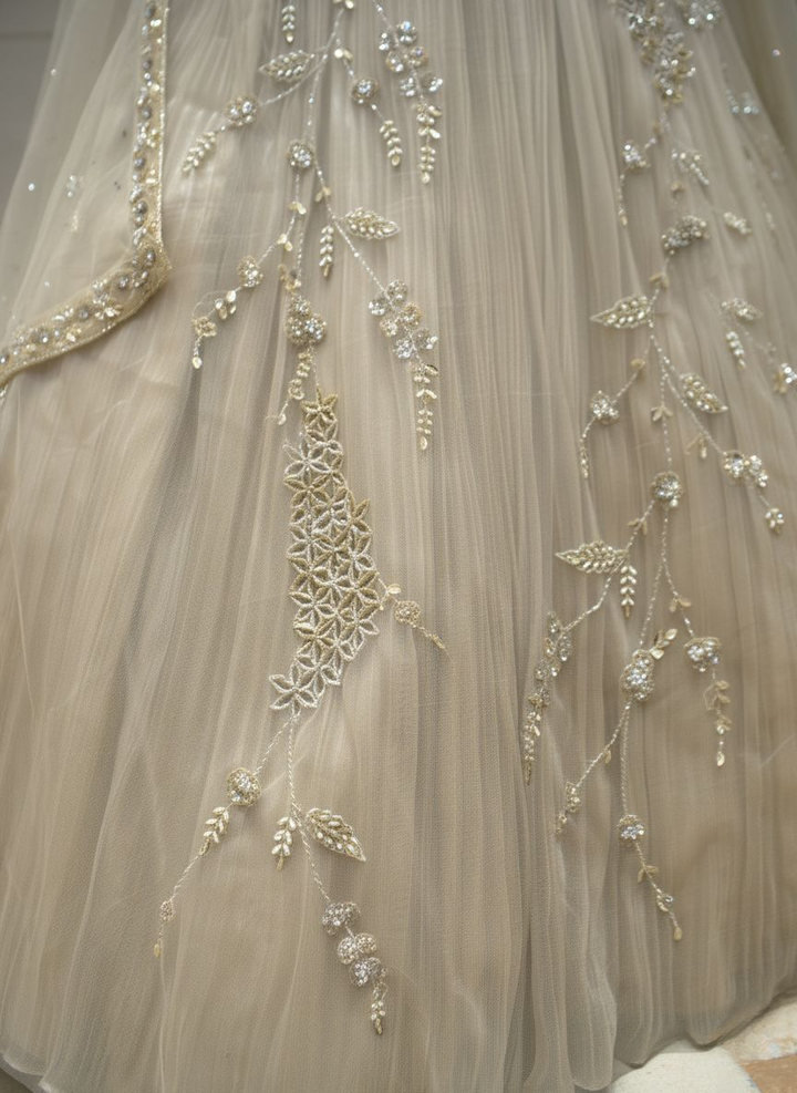 Champagne Gold Embroidered Net Lehenga Set with Cape Dupatta
