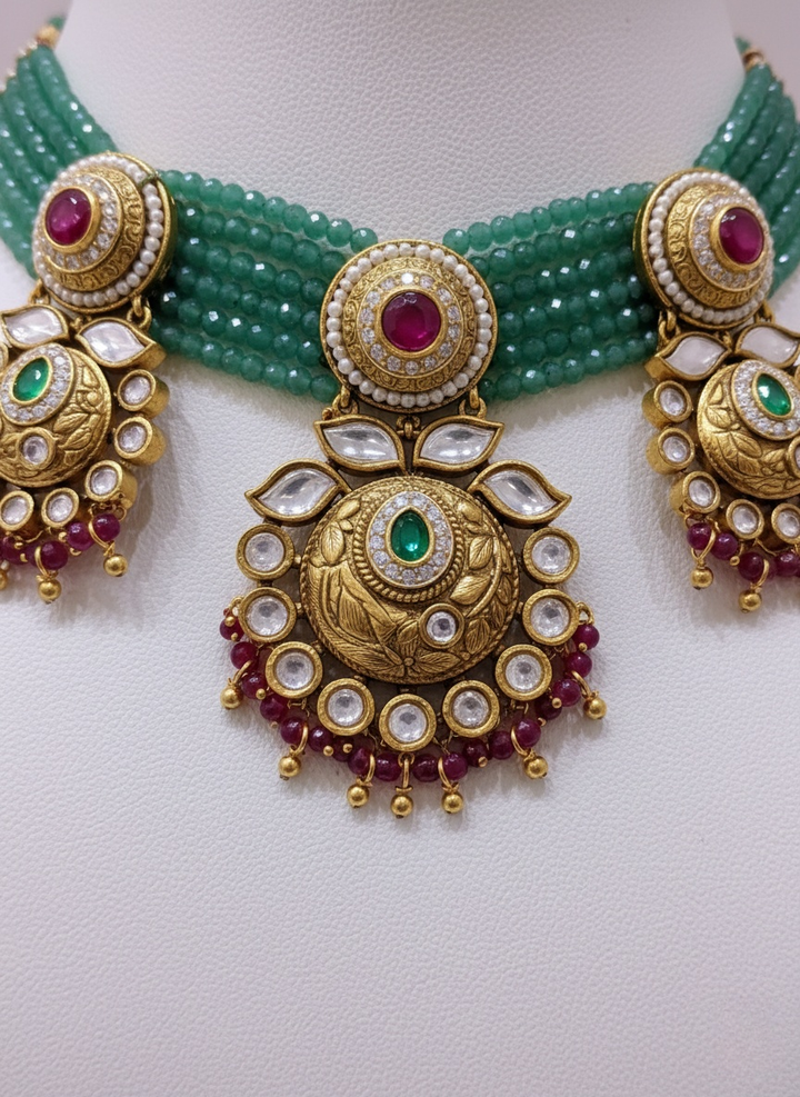 Royal Kundan Choker Necklace Set with Green Beads & Ruby Detailing