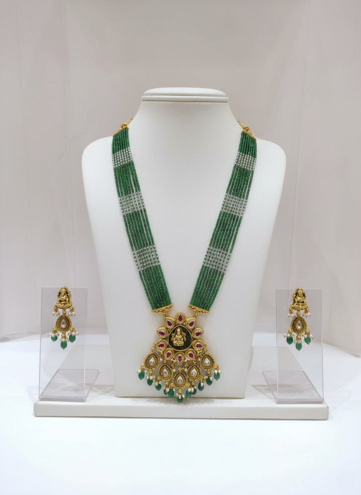 Majestic Gold & Green Kundan Necklace Set with Traditional Motif