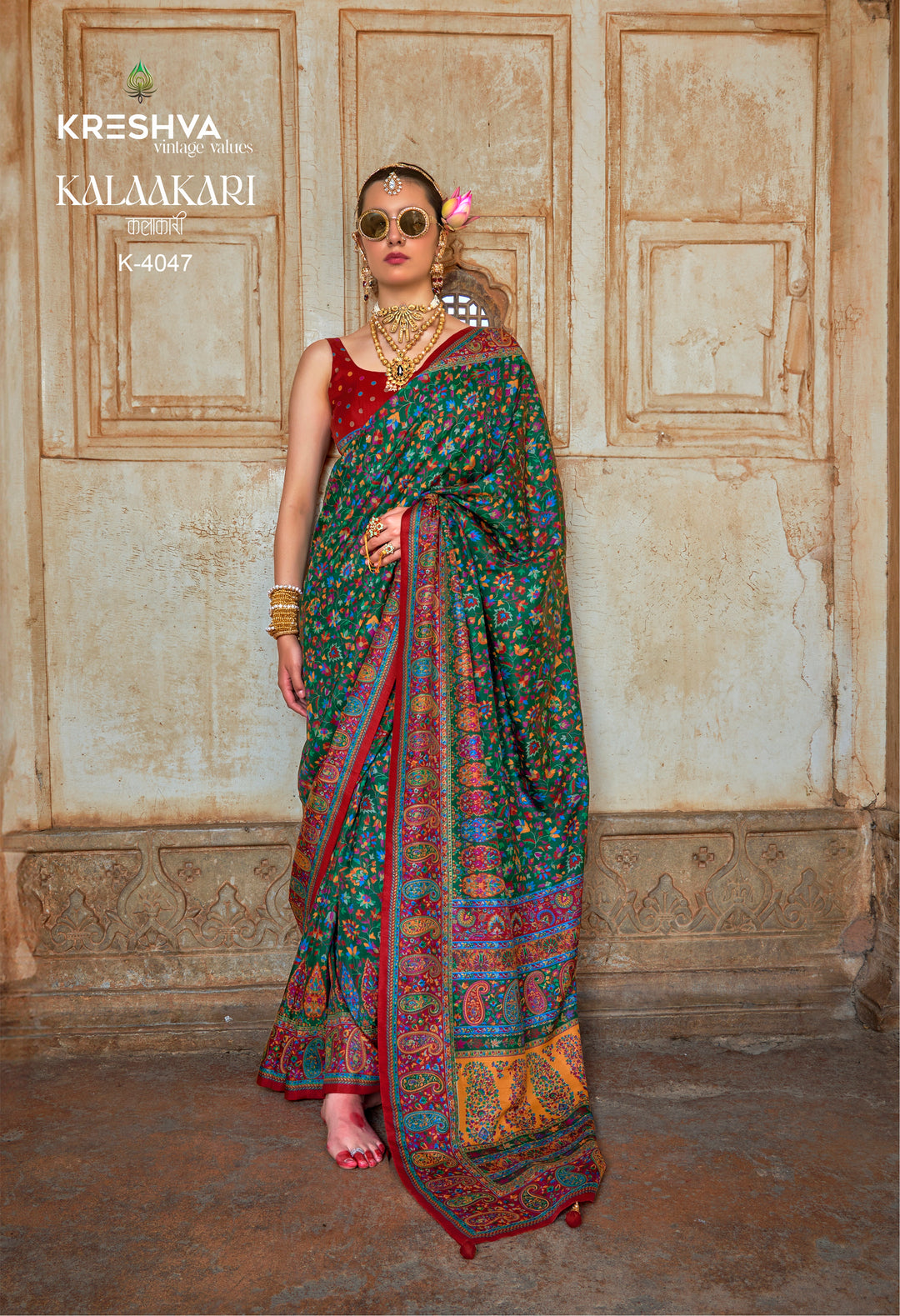 Green Pashmina Prints Inspired Designer Saree with Red Heritage Border