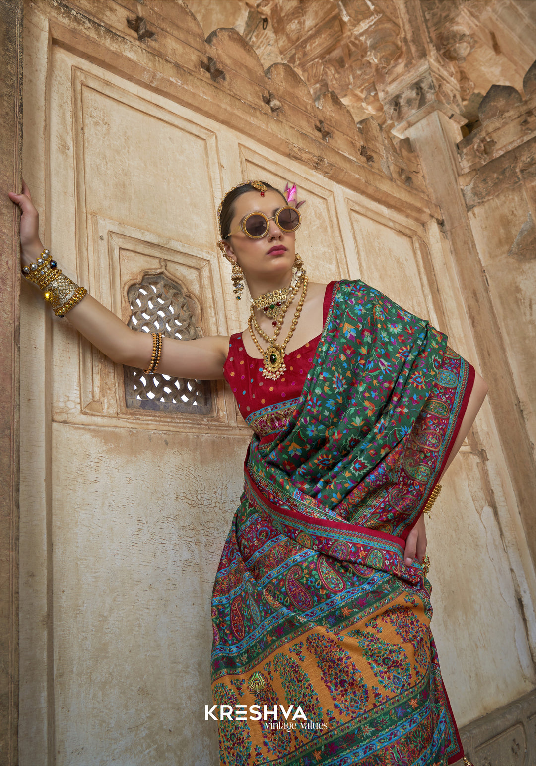 Green Pashmina Prints Inspired Designer Saree with Red Heritage Border