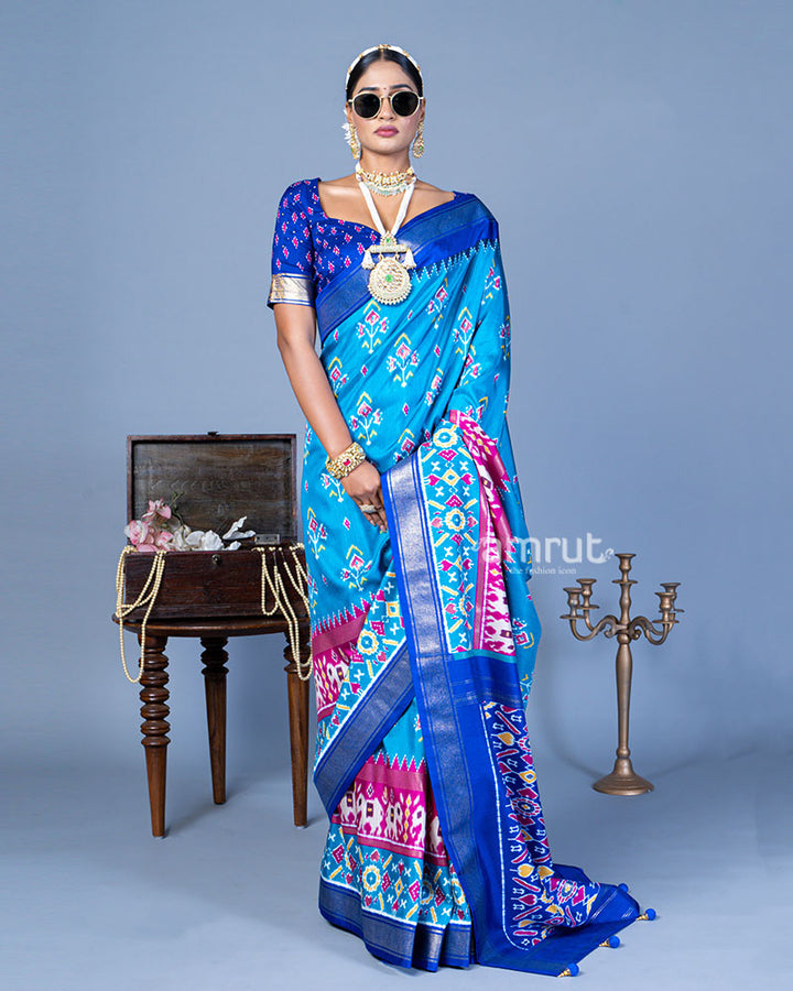 Light Blue Patola Printed Viscose Silk Saree with Royal Blue Border and Unstitched Blouse 01