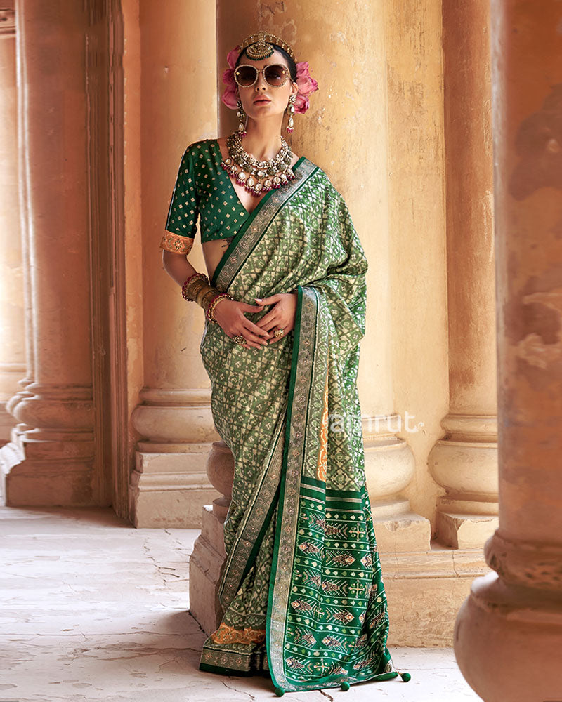 Light Green Patola Silk Saree with Embellished Border and Unstitched Blouse 01