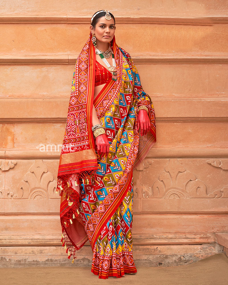 Multicolor Patola Print Traditional Saree With Red Zari Border and Unstitched Blouse 01