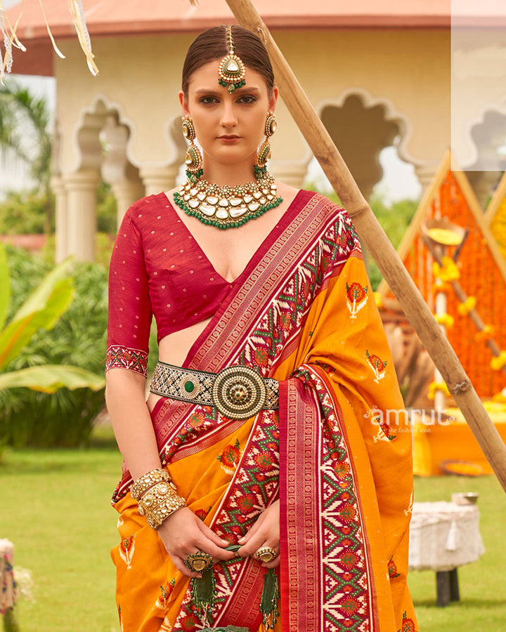 Mustard Yellow and Red Printed Patola Silk Saree with Zari Border and Unstitched Blouse 02
