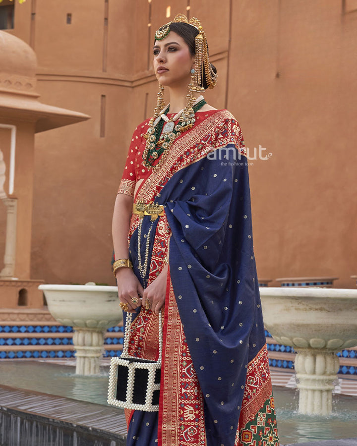 Navy Blue Pure Patola Silk Saree With Printed Border and Unstitched Blouse Piece