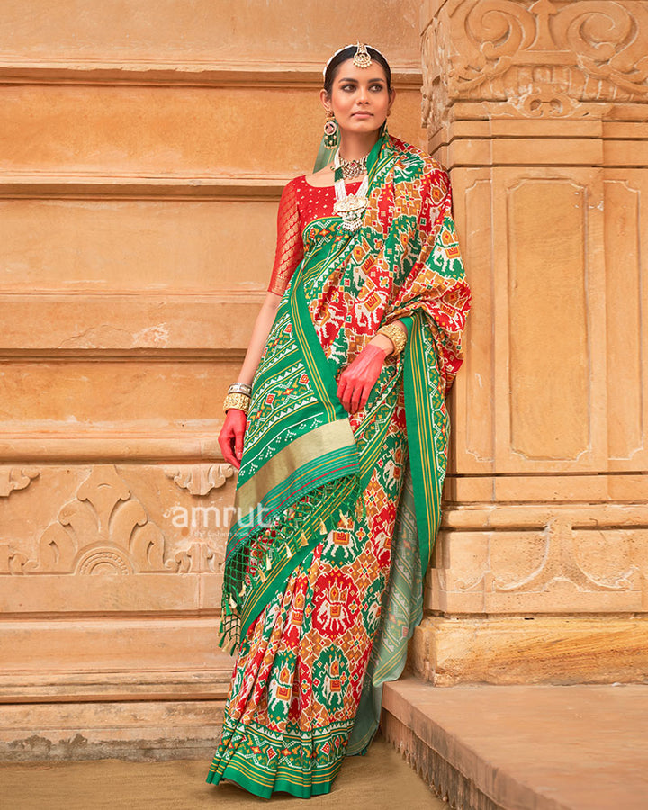 Red Patola Printed Saree with Green Zari Border and Unstitched Blouse 01