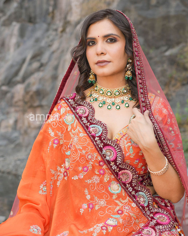 Rust Orange Lehenga Choli in Raw Silk With Multi Colored Hand Embroidery in Intricate Floral Motifs