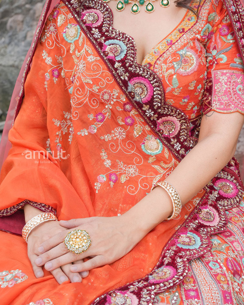 Rust Orange Lehenga Choli in Raw Silk With Multi Colored Hand Embroidery in Intricate Floral Motifs