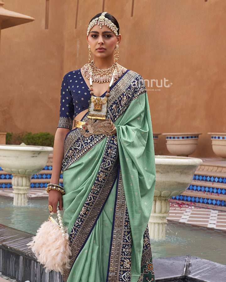 Sage Green Printed Patola Silk Saree With Blue Border and  Blouse Piece