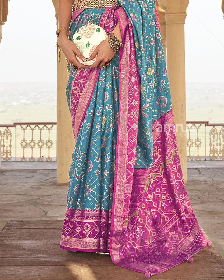 Sky Blue Patola Silk Saree With Printed Border and Unstitched Blouse Piece