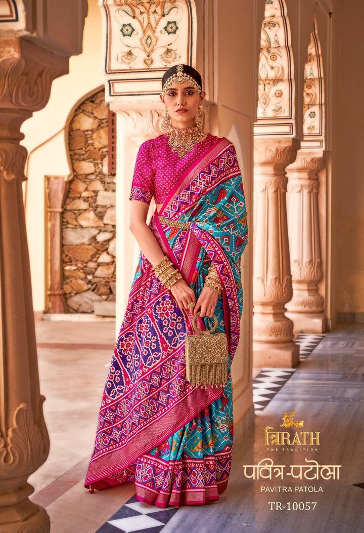 Pink & Teal Printed Patola Silk Saree with Geometric & Floral Double Ikat Weaving, Paired with Matching Unstitched Blouse