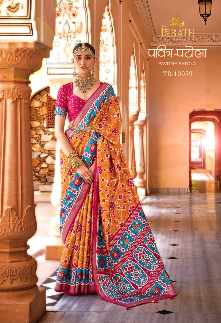 Pink & Orange Patola Silk Saree with Intricate Geometric Weaving, Paired with a Matching Blouse
