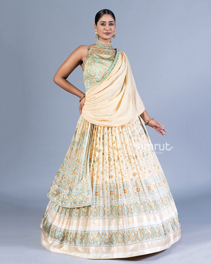 Teal and Cream Layered Pleated Gown with Golden Embellishments and Dupatta 001