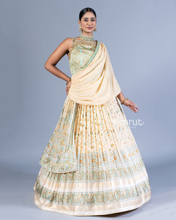 Teal and Cream Layered Pleated Gown with Golden Embellishments and Dupatta 001