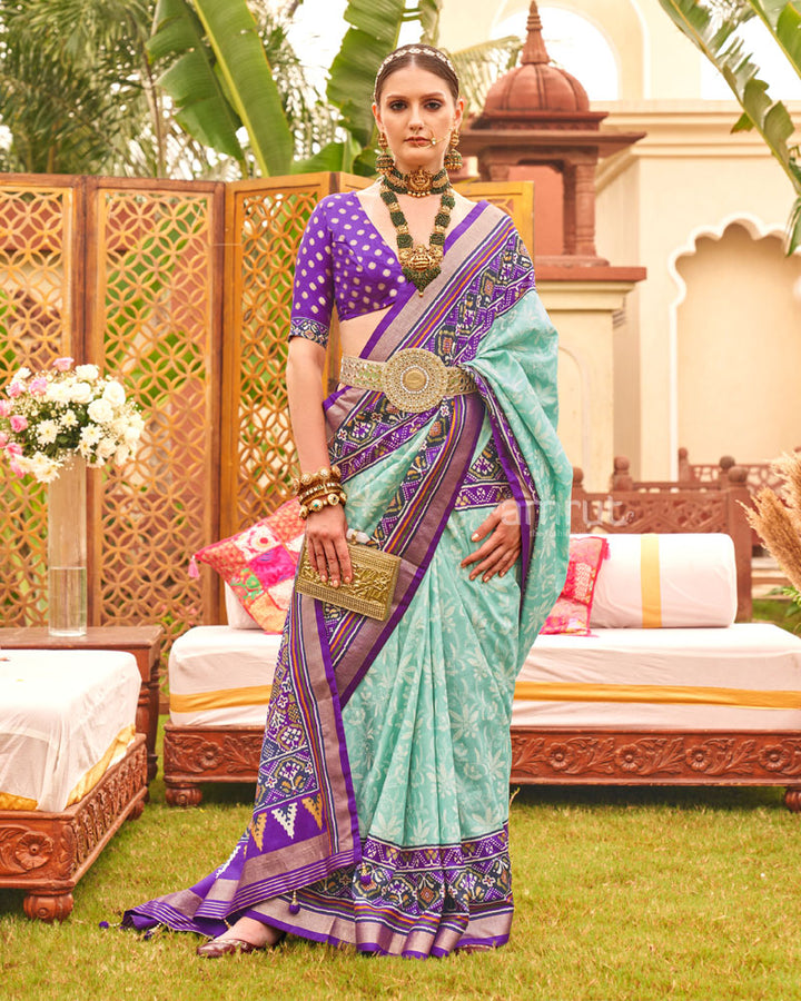 Turquoise Ikat Weave Printed Saree With Contrast Border