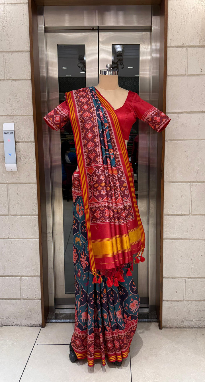 Teal Blue Patola Silk Saree with Reddish Embellished Border and Unstitched Blouse