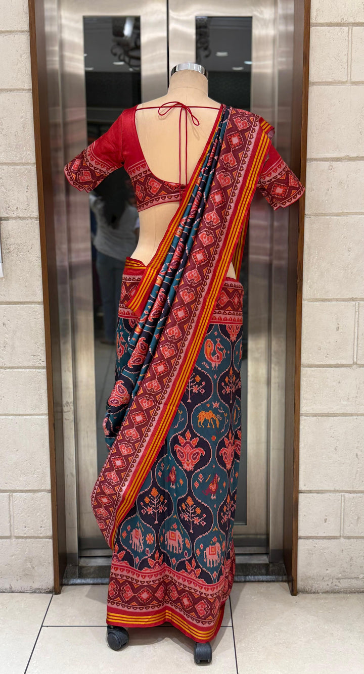 Teal Blue Patola Silk Saree with Reddish Embellished Border and Unstitched Blouse