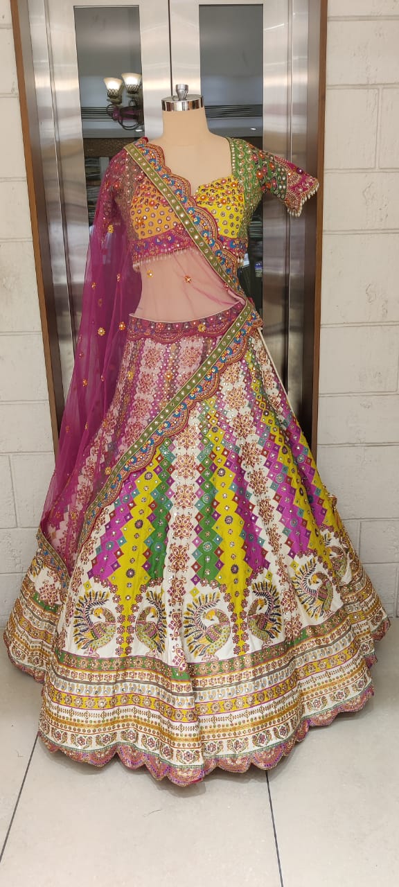 Radiant Multicolor Handcrafted Bridal Lehenga with Peacock Motifs & Mirror Work