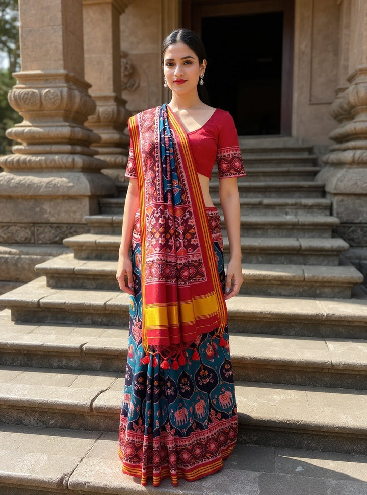Teal Blue Patola Silk Saree with Reddish Embellished Border and Unstitched Blouse