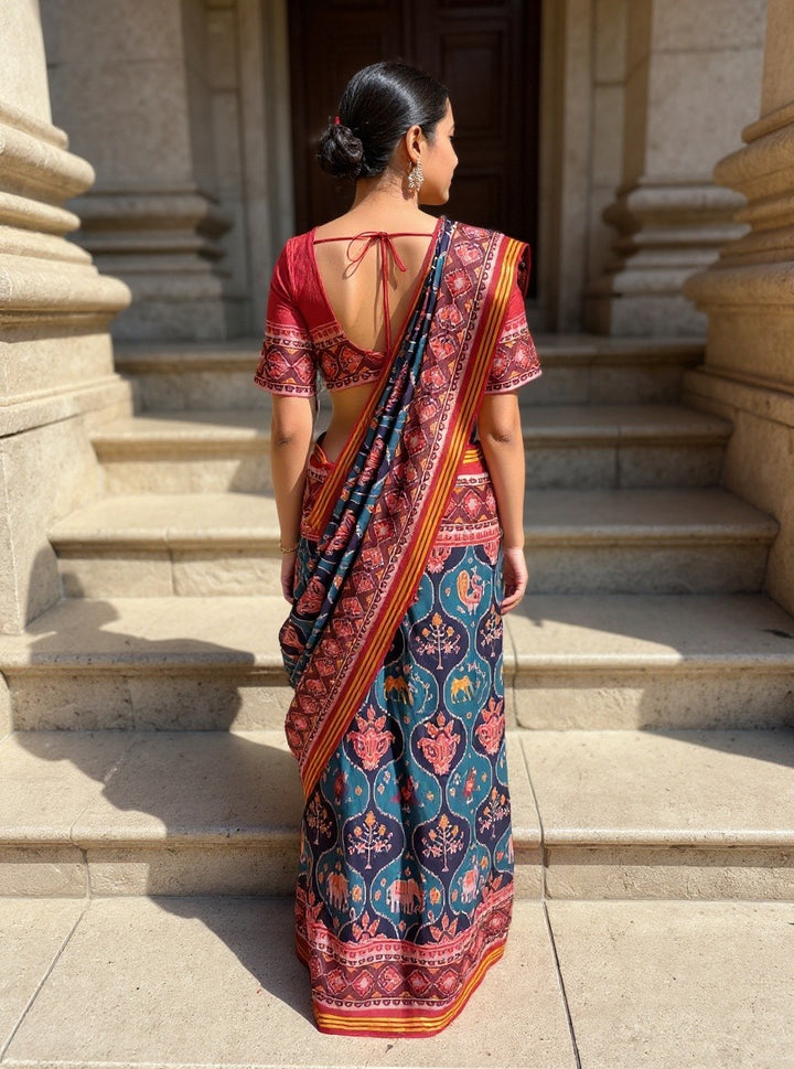 Teal Blue Patola Silk Saree with Reddish Embellished Border and Unstitched Blouse