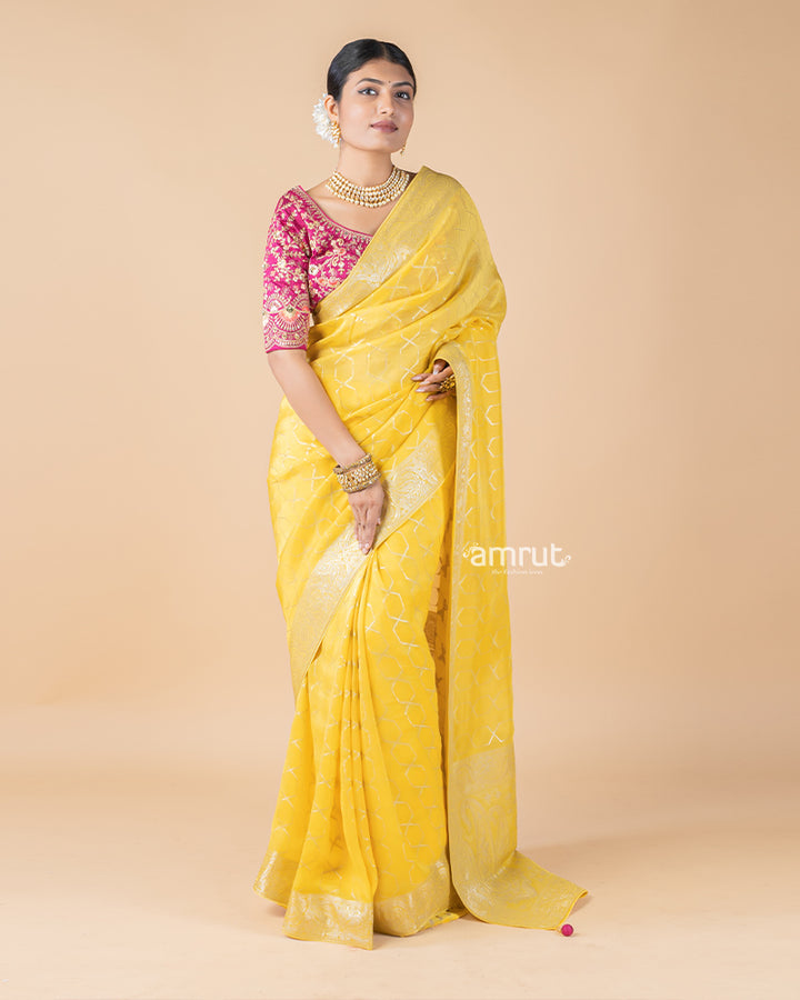 Yellow Foil Printed Saree With Tassels and Stitched Blouse