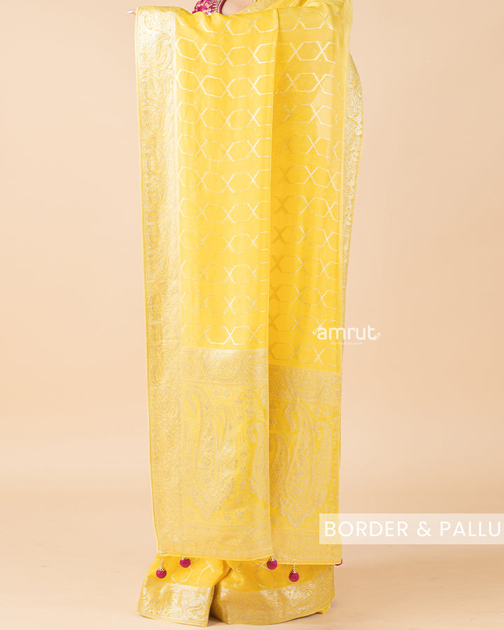 Yellow Foil Printed Saree With Tassels and Stitched Blouse