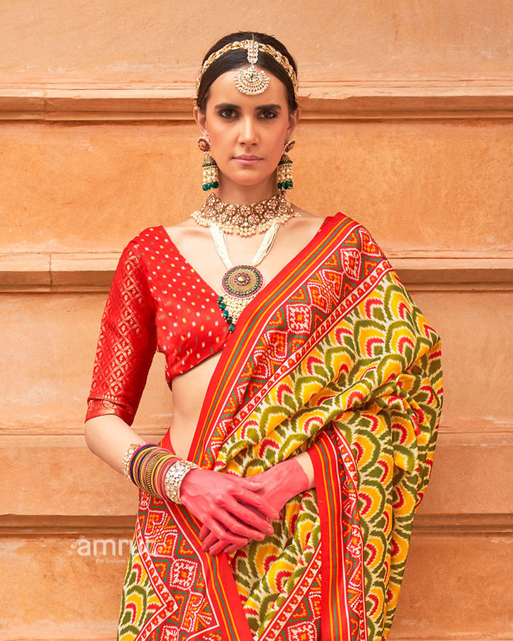 Yellow Green Patola Printed Saree with Red Zari Border and Unstitched Blouse 02