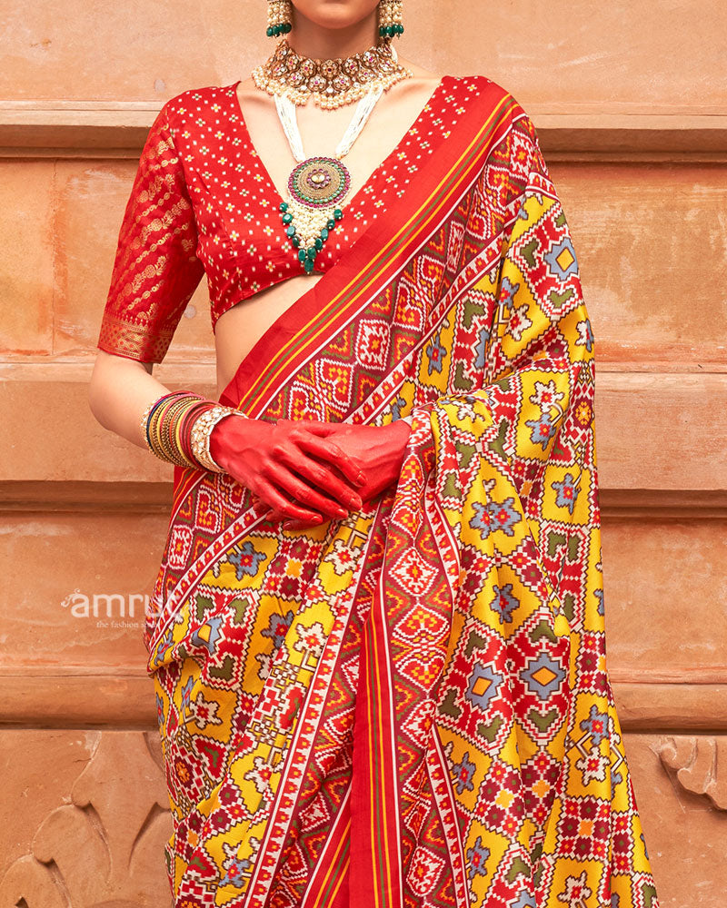Yellow Patola Printed Saree with Red Zari Border and Unstitched Blouse 03