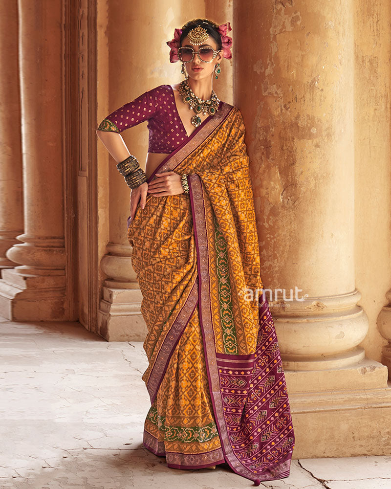 Yellow Patola Silk Saree with Purple Embellished Border and Unstitched Blouse 01