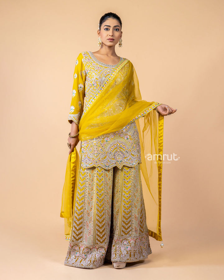 Yellow hand Embroidered Palazzo Set with a Net Dupatta