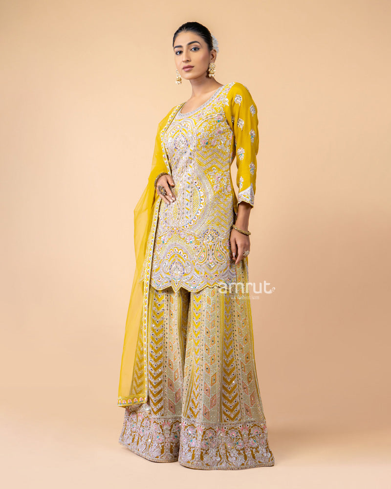 Yellow hand Embroidered Palazzo Set with a Net Dupatta