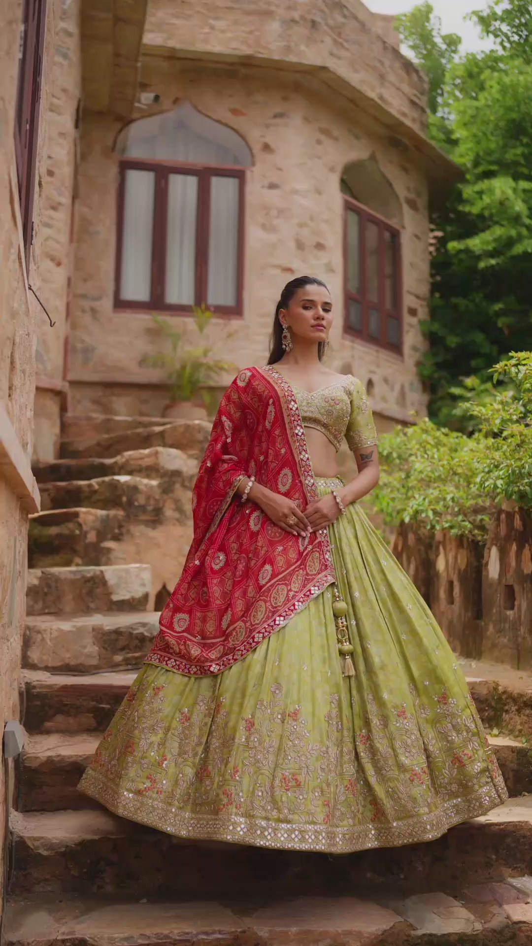 Lime Green Lehenga Choli with Red Dupatta and Intricate Golden Embroidery