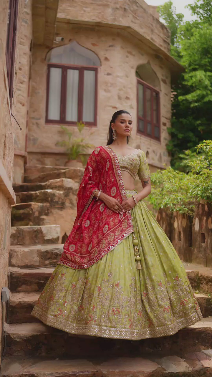 Lime Green Lehenga Choli with Red Dupatta and Intricate Golden Embroidery