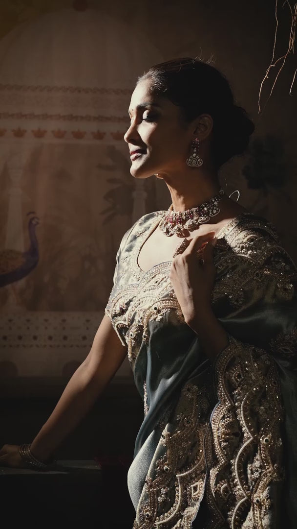 Pastel Green Silk Saree with Intricate Embroidery & Elegant Zari Border