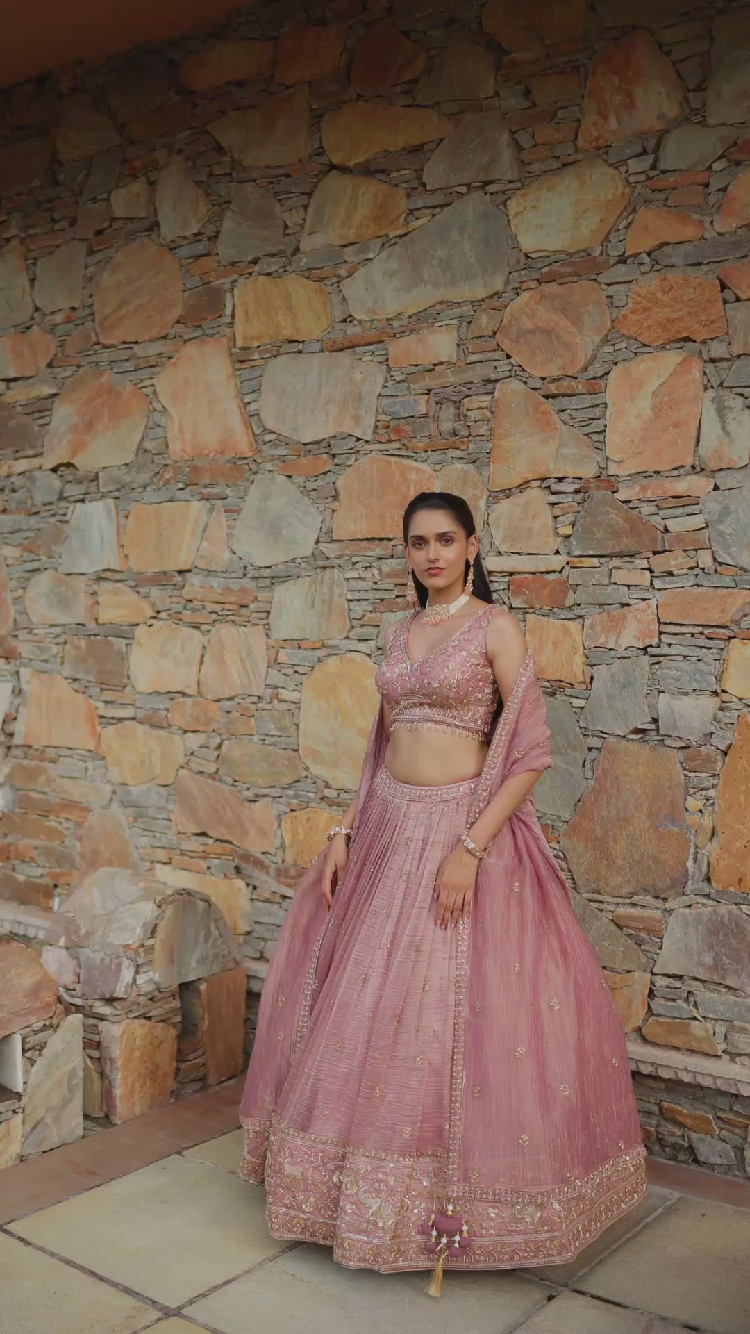 Dusty Pink Lehenga Choli with Intricate Golden Embroidery and Embellished Border