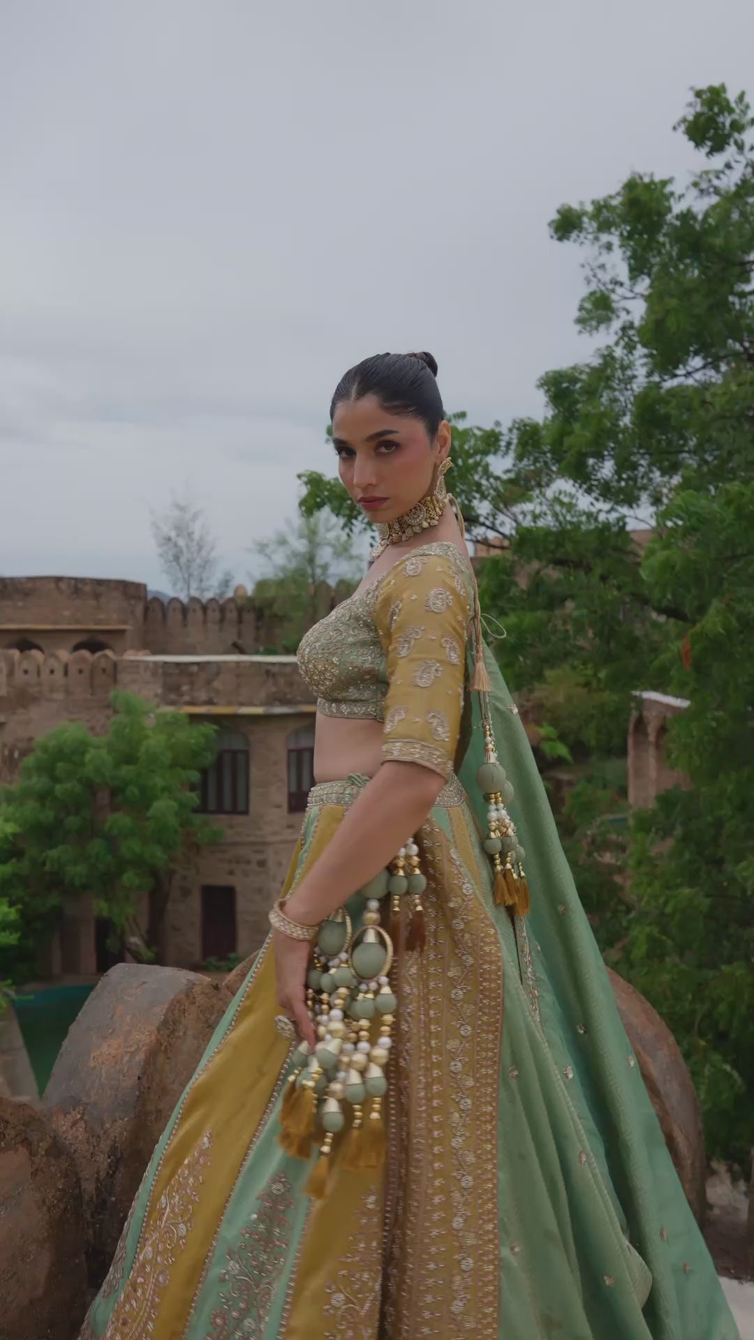 Mustard Yellow and Mint Green Lehenga Choli with Golden Embroidery and Panel Detailing