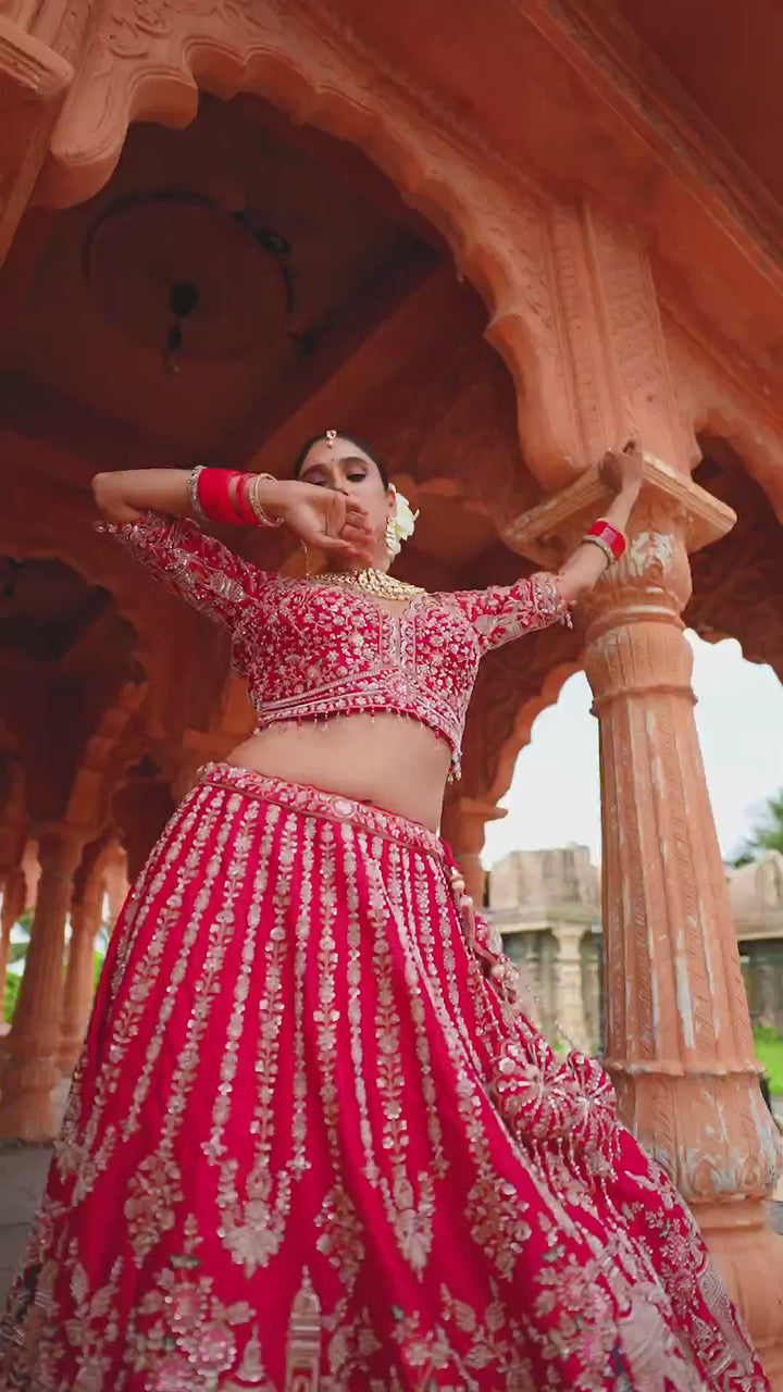 Rang Mahal Vermilion Red Bridal Lehenga Choli with Intricate Silver Embroidery