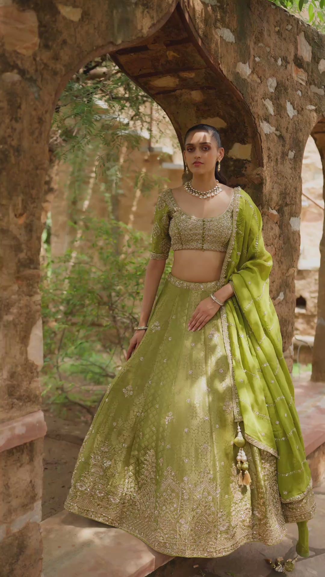 Olive Green Designer Lehenga Choli with Intricate Golden Embroidery and Traditional Motifs