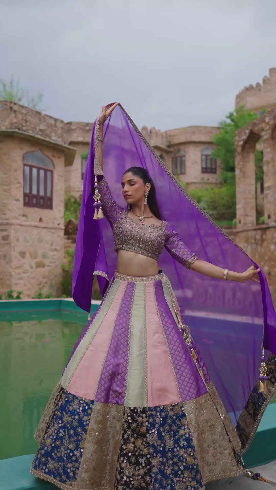 Purple and Multicolour Lehenga Choli with Patchwork Panels and Golden Embroidery