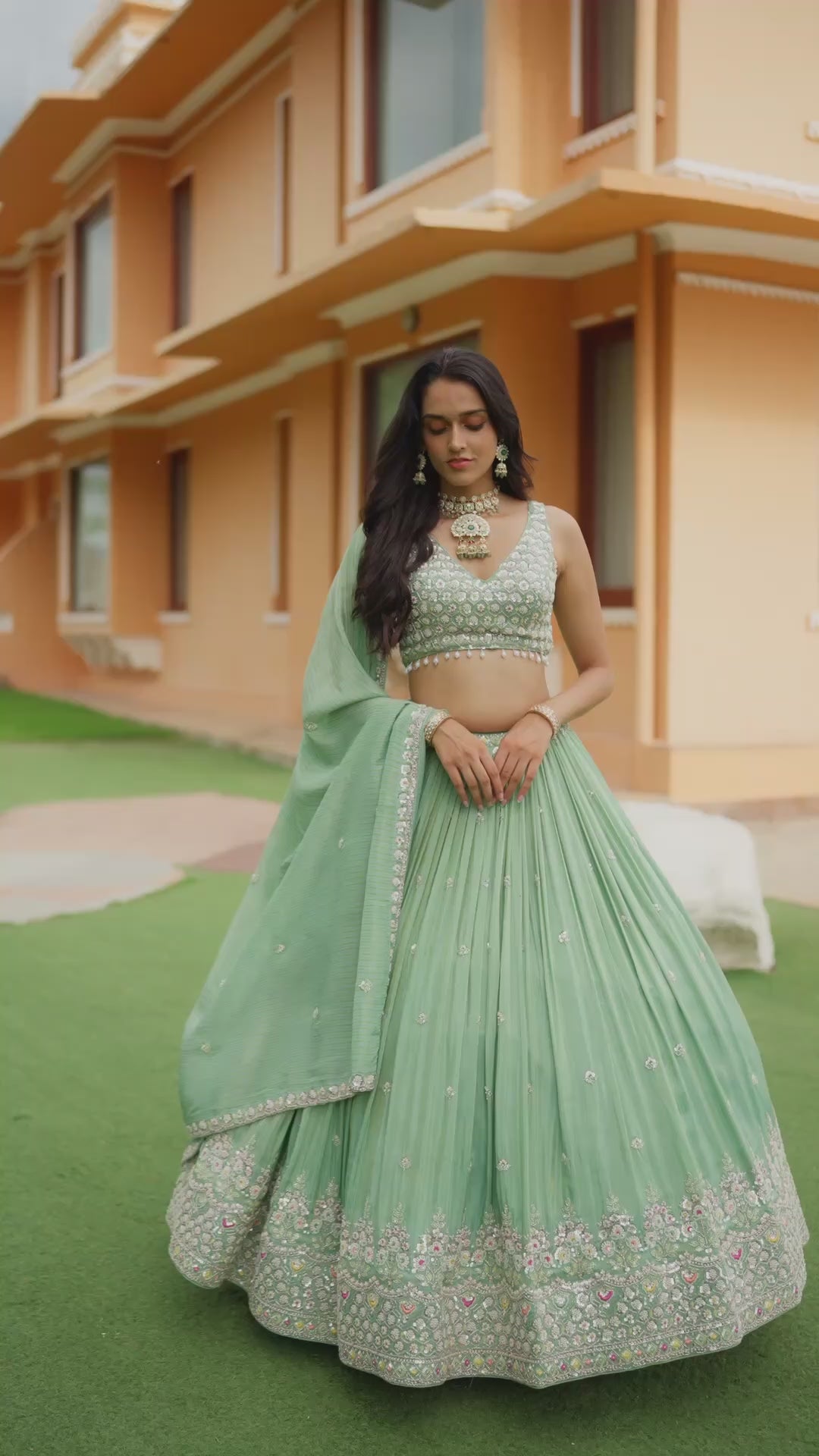 Pastel Mint Green Lehenga Choli Set with Intricate Multicolour Embroidery