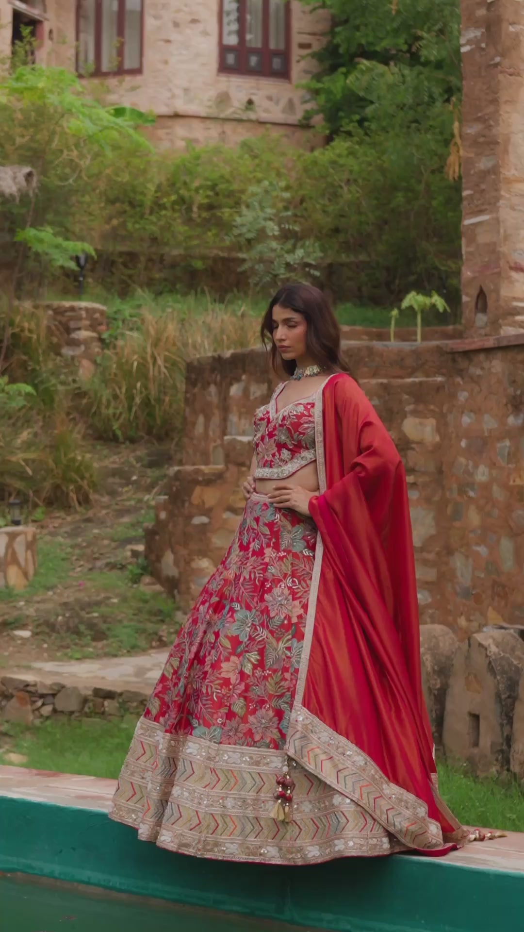 Coral Pink Floral Lehenga Choli with Red Dupatta and Golden Embroidery