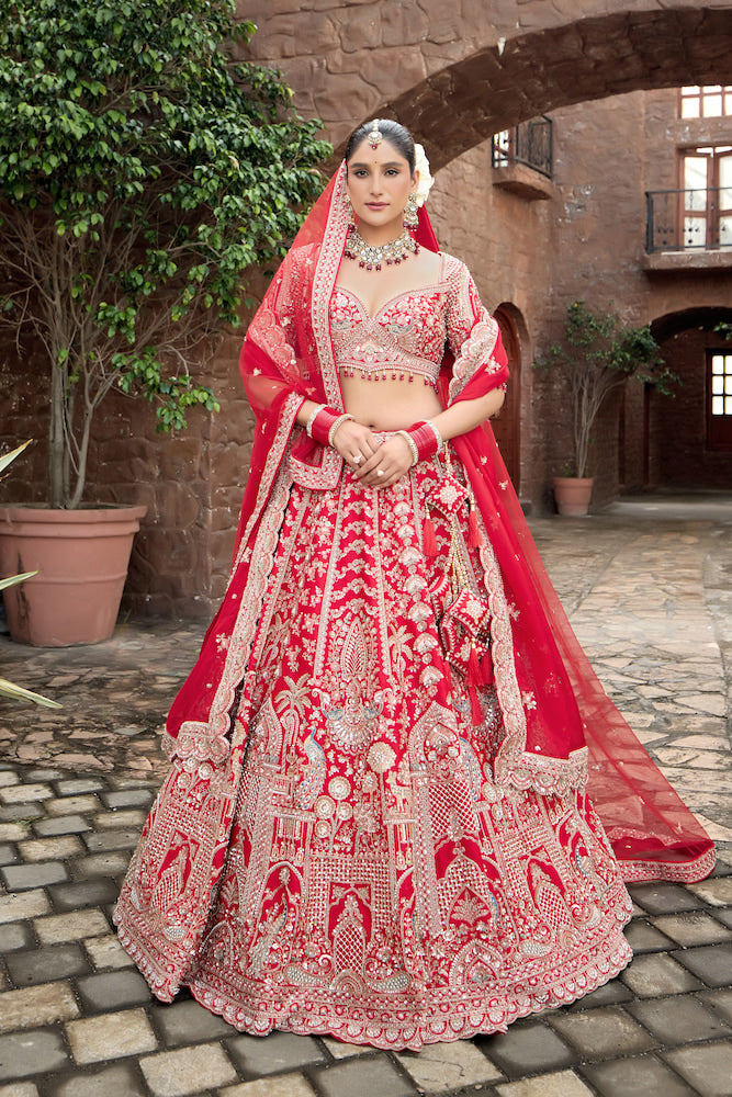 Crimson Royale – Red Bridal Lehenga with Intricate Silver Zari Embroidery